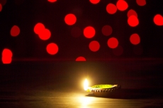 red coloured lights and diya 