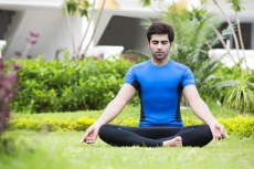 boy meditating in morning 