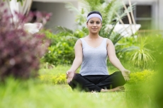 girl practicing yoga early morning