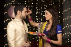 couple celebrating diwali at home 
