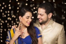 man gifting necklace to his wife 