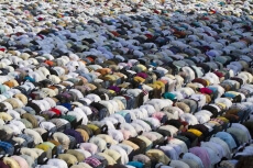 people bow down for prayer 