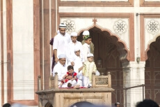 people along with children at jama masjid