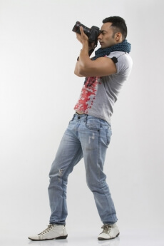 portrait of a well-built man taking pictures