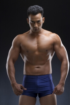 body builder male in blue trunks
