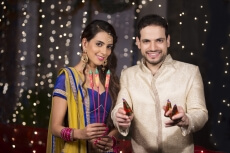 couple with crackers on diwali 