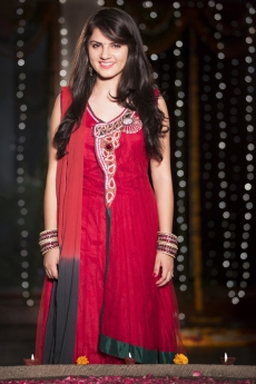 woman standing and posing in traditional wear 