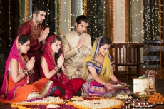 couples doing diwali pooja