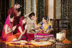 couples doing diwali pooja