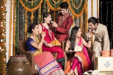 couples feeding sweets to each other on diwali  