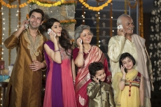 family talking on mobile phones 