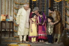 family doing diwali pooja 