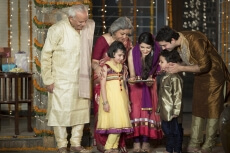 family doing diwali pooja 
