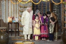 family doing diwali pooja 
