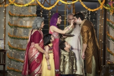 family doing diwali pooja 