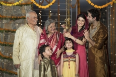family doing diwali pooja 