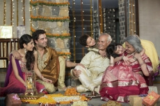  family celebrating diwali together 
