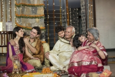  family celebrating diwali together 