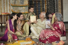  family celebrating diwali together 