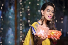 woman with diwali gifts 