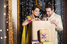 couple opening diwali presents 