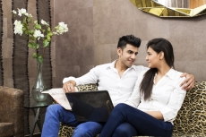 couple at home looking at each other