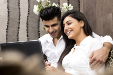 couple with laptop