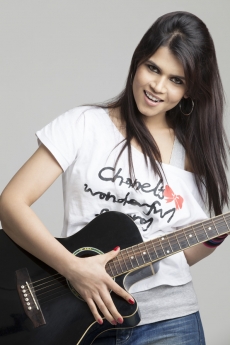 woman playing guitar