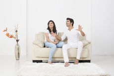 couple conversing for their new home interior 
