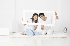 newly wed couple in new home 