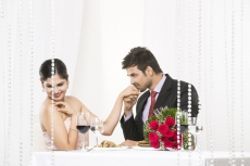 girl blushing when man kissed her hand 