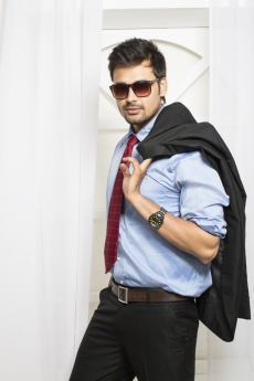 man in formal wear with sunglasses 
