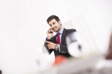 businessman on phone at the restaurant