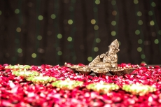 lord ganesha idol and diya stand 