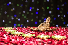lord ganesha idol and diya stand 