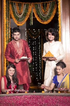 couples decorating home on diwali 