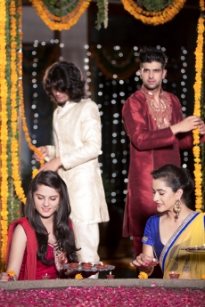 couples decorating home on diwali 