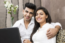 young couple posing at home