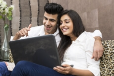 couple browsing and smiling 