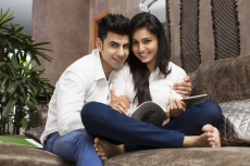 couple on couch having leisure time