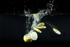 sliced lemons in water 