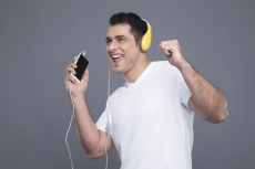 man listening to music on phone