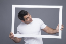 man looking through the frame 