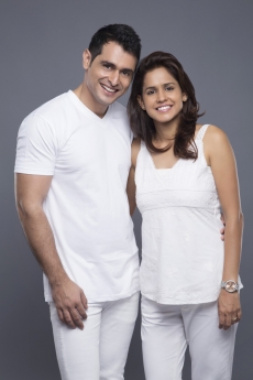 happy married couple posing together