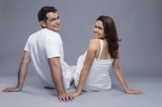 back view of a couple sitting with each other
