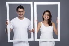 couple looking through the frame 