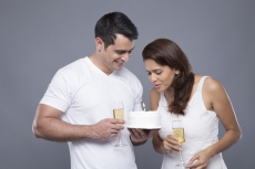 couple celebrating birthday with champagne