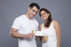 couple celebrating birthday with champagne