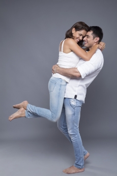 man lifting woman out of love 