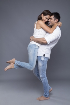 man lifting woman out of love 